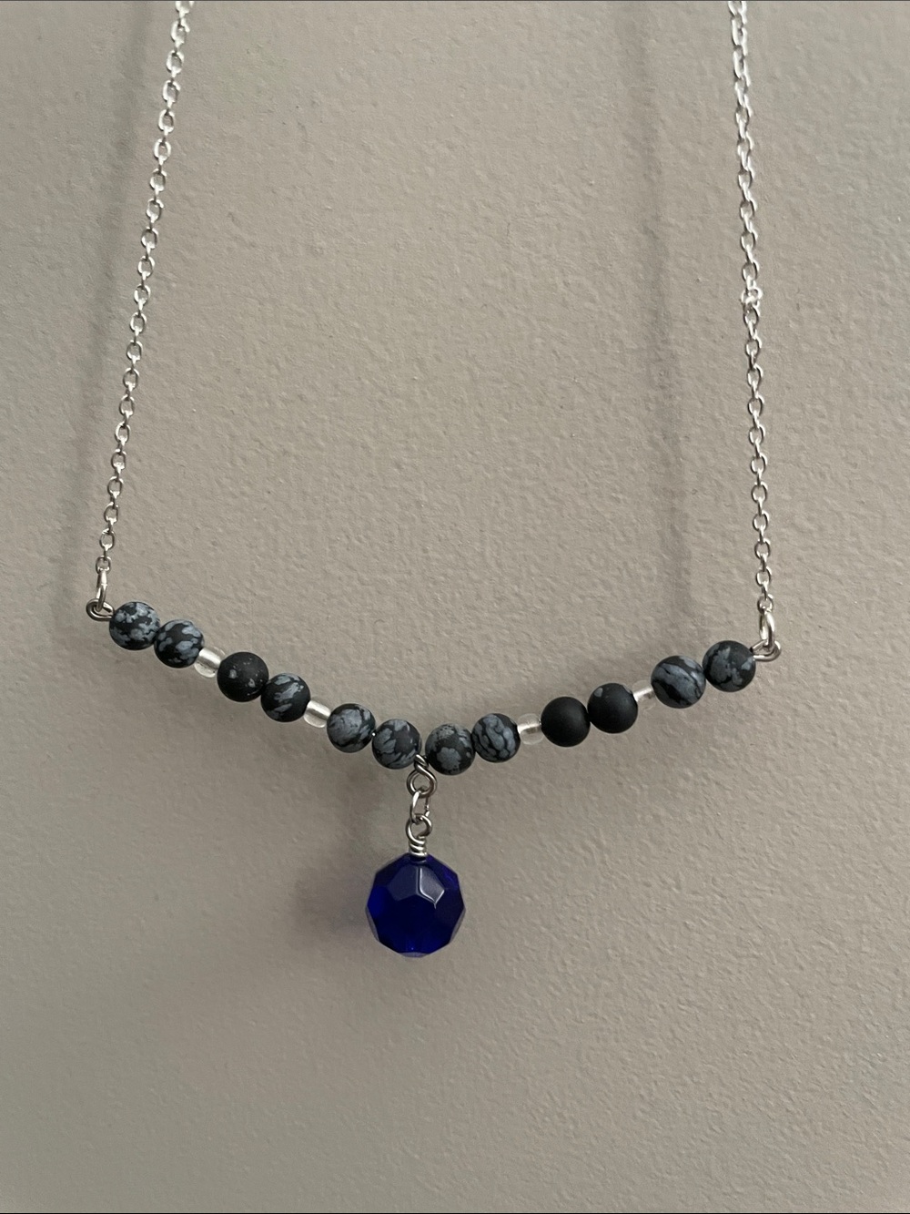 Delicate black snowflake obsidian round gemstones with blue glass wire Necklace.